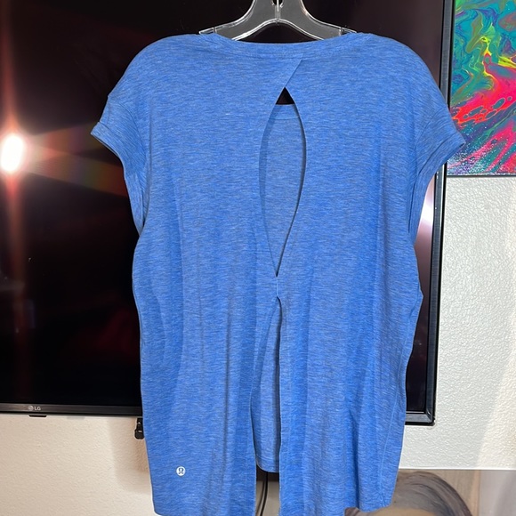 Lululemon active wear T-shirt with the back out. - Picture 2 of 3